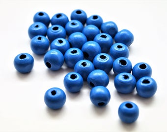 Natural wood beads round blue 10 mm