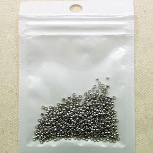 Perles à écraser rondes 2 mm par lot de 250 Rhodium