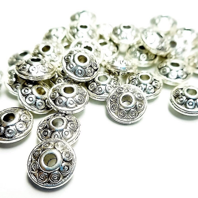 Perles intercalaires ovales 6 mm Argent