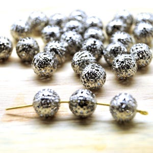 Beads 10 mm metal mat silver filigrane