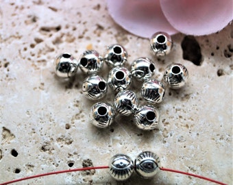 Round silver metal eye beads 6 mm