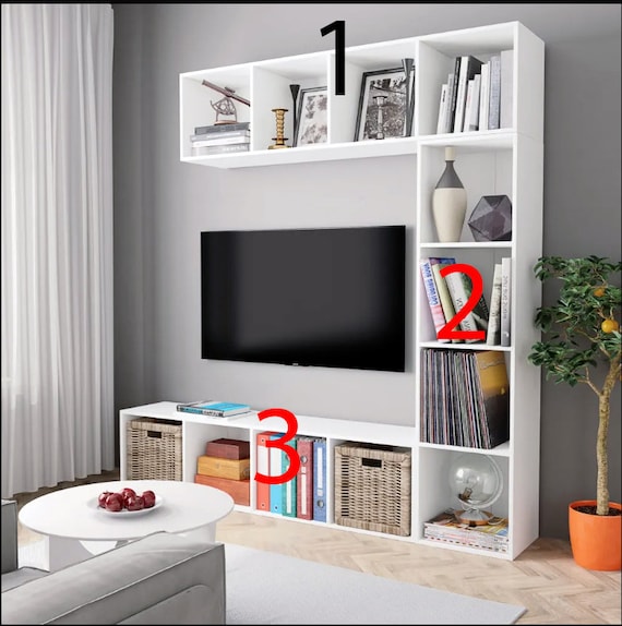 An old TV stand turned nursery book storage - Green With Decor