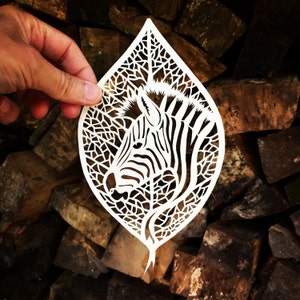 Zebra leaf papercut by Jo Chorny - PeaceOfPaper