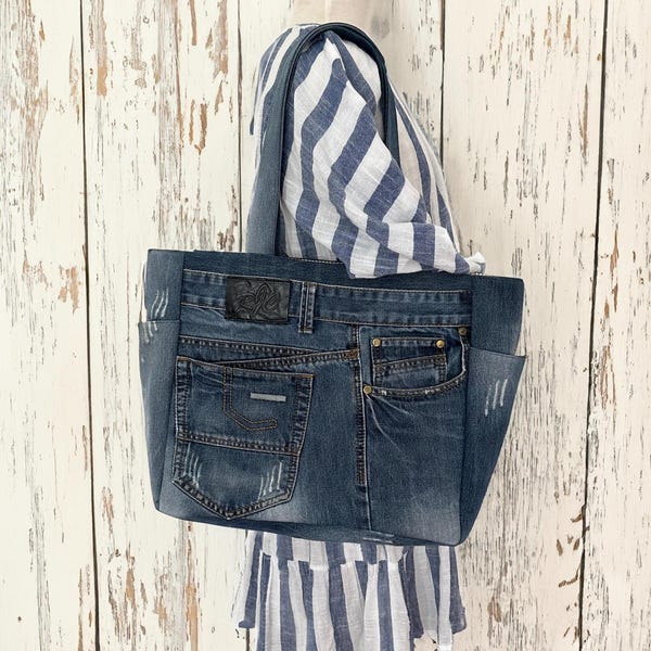 The Upcycled Denim Tote Bag is a fantastic blend of style, sustainability, and practicality