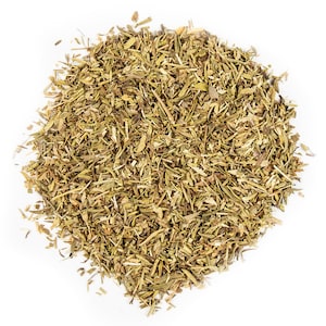 May include: A close-up of a pile of dried thyme leaves, a popular herb used in cooking.