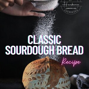 May include: A round loaf of sourdough bread with a leaf-patterned crust, dusted with white flour from a metal sieve. The text reads: REIMAGINED HANKERIE SOURDOUGH, CLASSIC SOURDOUGH BREAD Recipe, and HANKERIE.COM.
