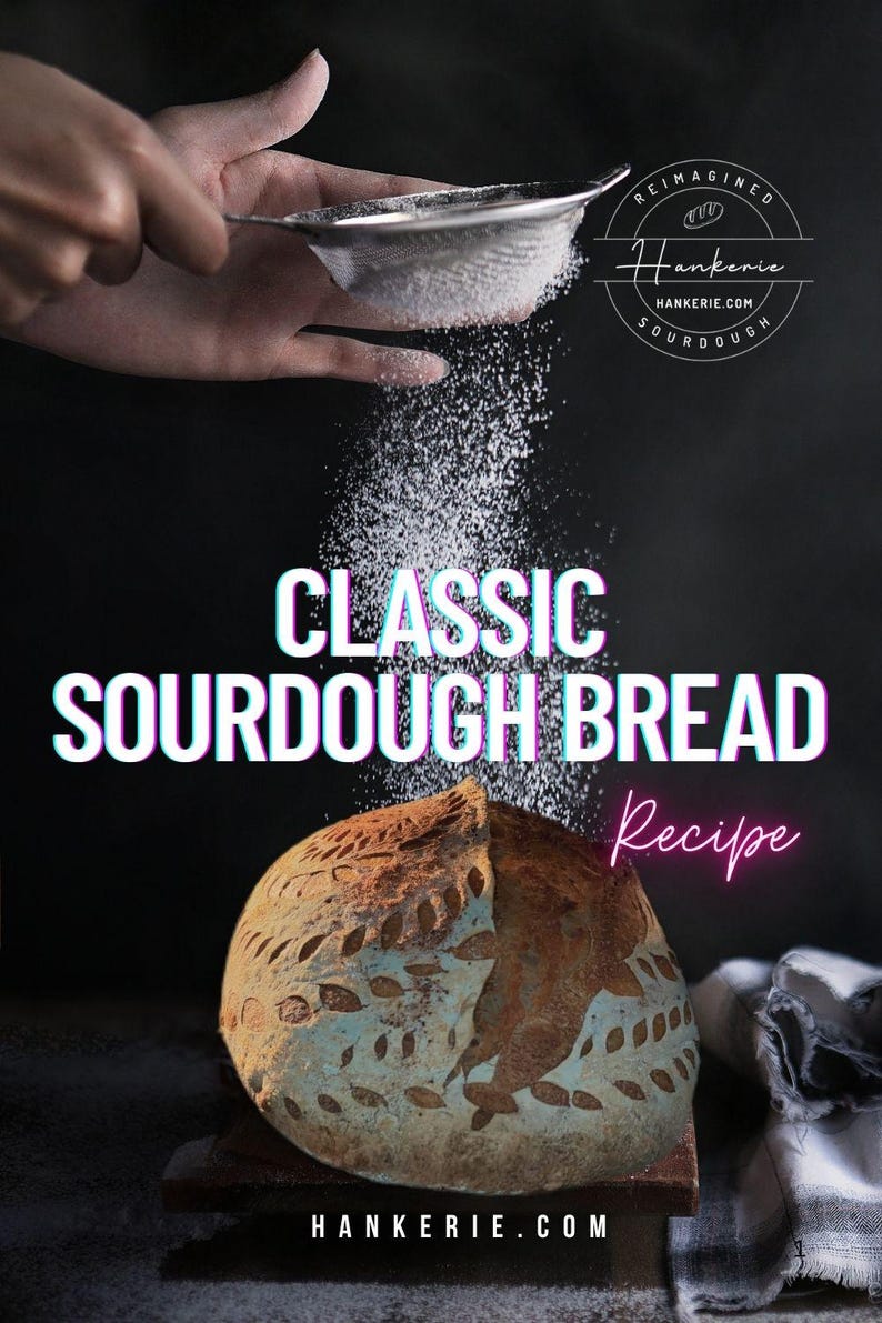 May include: A round loaf of sourdough bread with a leaf-patterned crust, dusted with white flour from a metal sieve. The text reads: REIMAGINED HANKERIE SOURDOUGH, CLASSIC SOURDOUGH BREAD Recipe, and HANKERIE.COM.