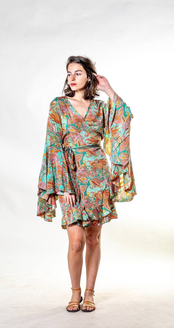 short boho dress with long sleeves utcoco Womens 2025 Summer Beach Boho Mini Dress Flared Sleeve V Neck Hollow Out Lace Flowy Dresses (Small, Apricot) at Amazon Women's Clothing store