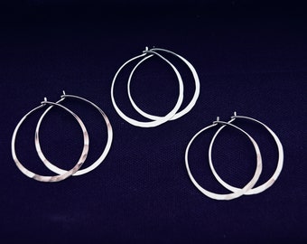 Medium hammered hoop earrings in Sterling  Silver