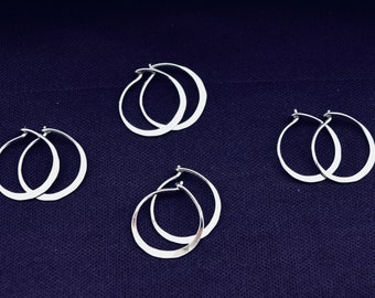 Small hammered hoop earrings in Sterling  Silver