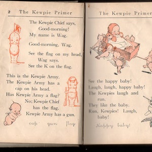 May include: Open book pages from "The Kewpie Primer" featuring illustrations of Kewpie dolls. The left page shows a Kewpie with a flag, text includes "Good-morning!" and "My name is Wag." The right page depicts Kewpies in a wagon.
