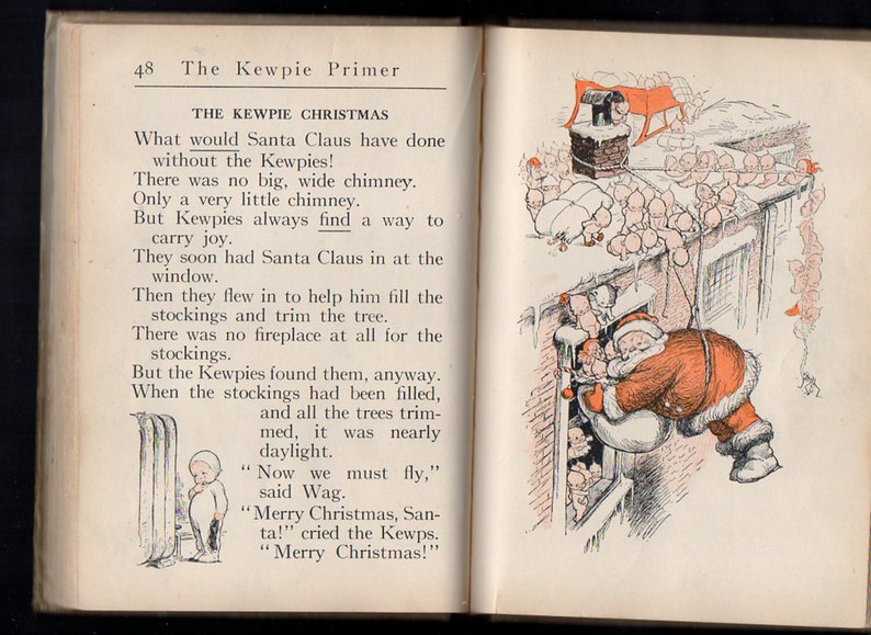 May include: An open book page with a vintage illustration of Santa Claus entering a window, surrounded by Kewpies. The text reads "The Kewpie Christmas" and describes Santa's visit. The illustration is in red, black, and white.