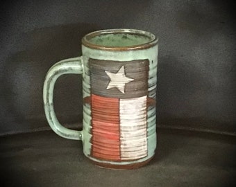 the Texas Pint   new from Bruen Pottery- this sturdy handmade Stein wearing the flag of Texas- holds 18 ounces- leadfree and dishwasher safe