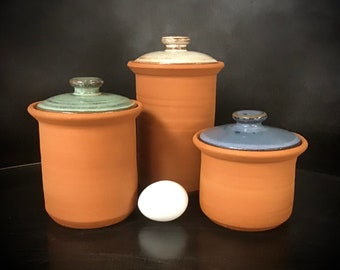 Colorful Small Canister Set    Rustic but Colorful,   4 1/2" each in diameter, 5", 6" & 8" tall.