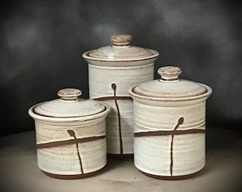 Mid Size Alabaster White  Canister set   largest piece is 8 1/2" tall and holds 6 1/2 cups