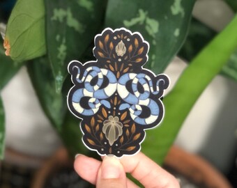 Serpientes, mariposas y escarabajos de arte popular