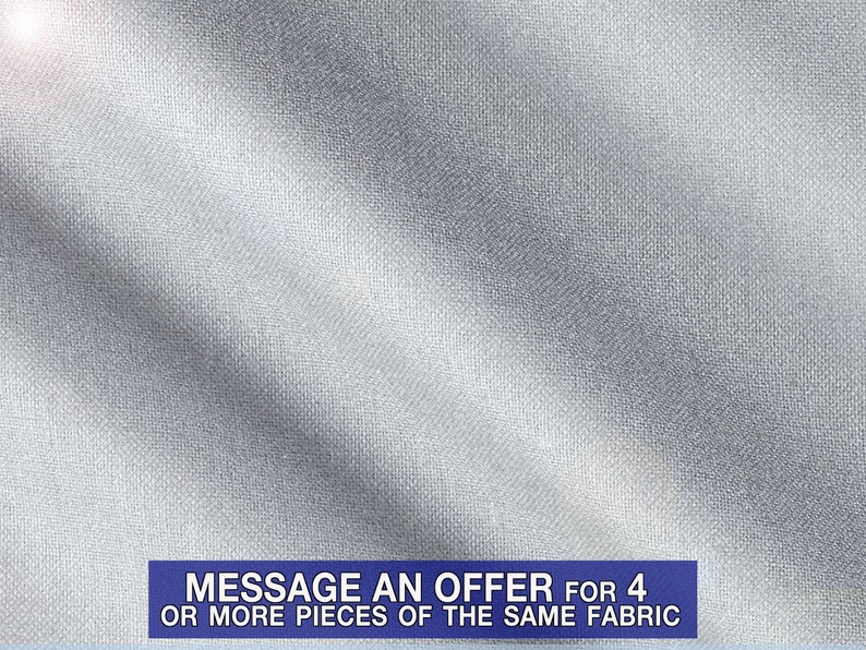 a silver fabric with a message on it that says message an offer for 4 or