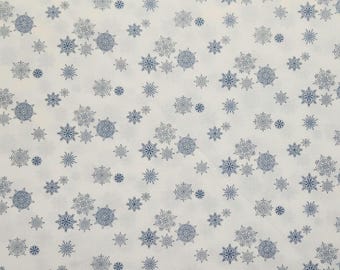 Winter flurries. Blue Snowflakes yardage by Moda Fabrics, 100% premium cotton. Sold by the yard.