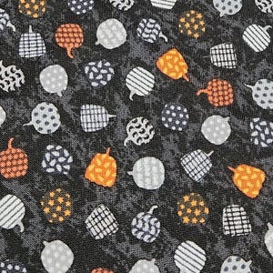 Midnight magic. Geometric Pumpkins on Black and Gray from Studio e Fabrics, 100% premium cotton. Sold by the Yard