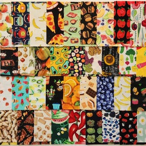 May include: A collection of fabric squares with various food-themed patterns. Designs include fruits like apples, bananas, and strawberries, vegetables, pizza slices, sushi, and chocolate bars. The fabrics are in a variety of colors, including red, yellow, green, and black.