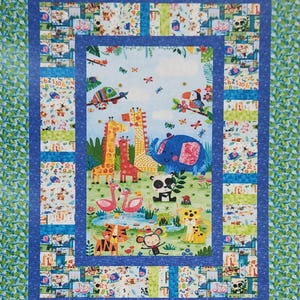May include: A rectangular quilt featuring a central panel with a colorful jungle scene of giraffes, an elephant, a panda, flamingos, a tiger, and a monkey. The panel is framed by a blue border and a patterned border of small animal illustrations.