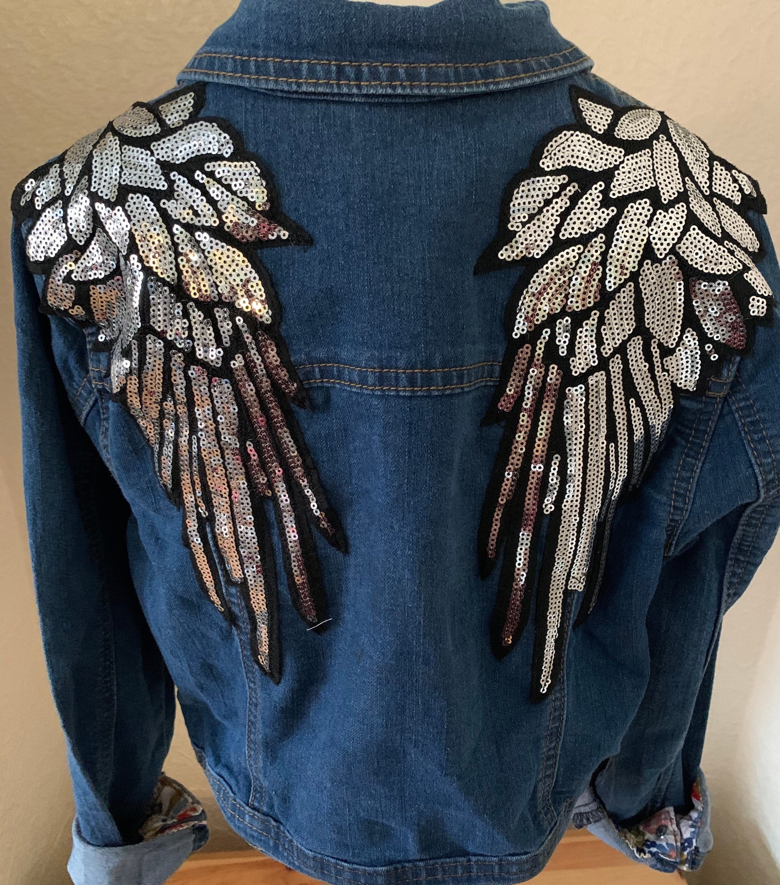 denim jacket with sequin angel wings
