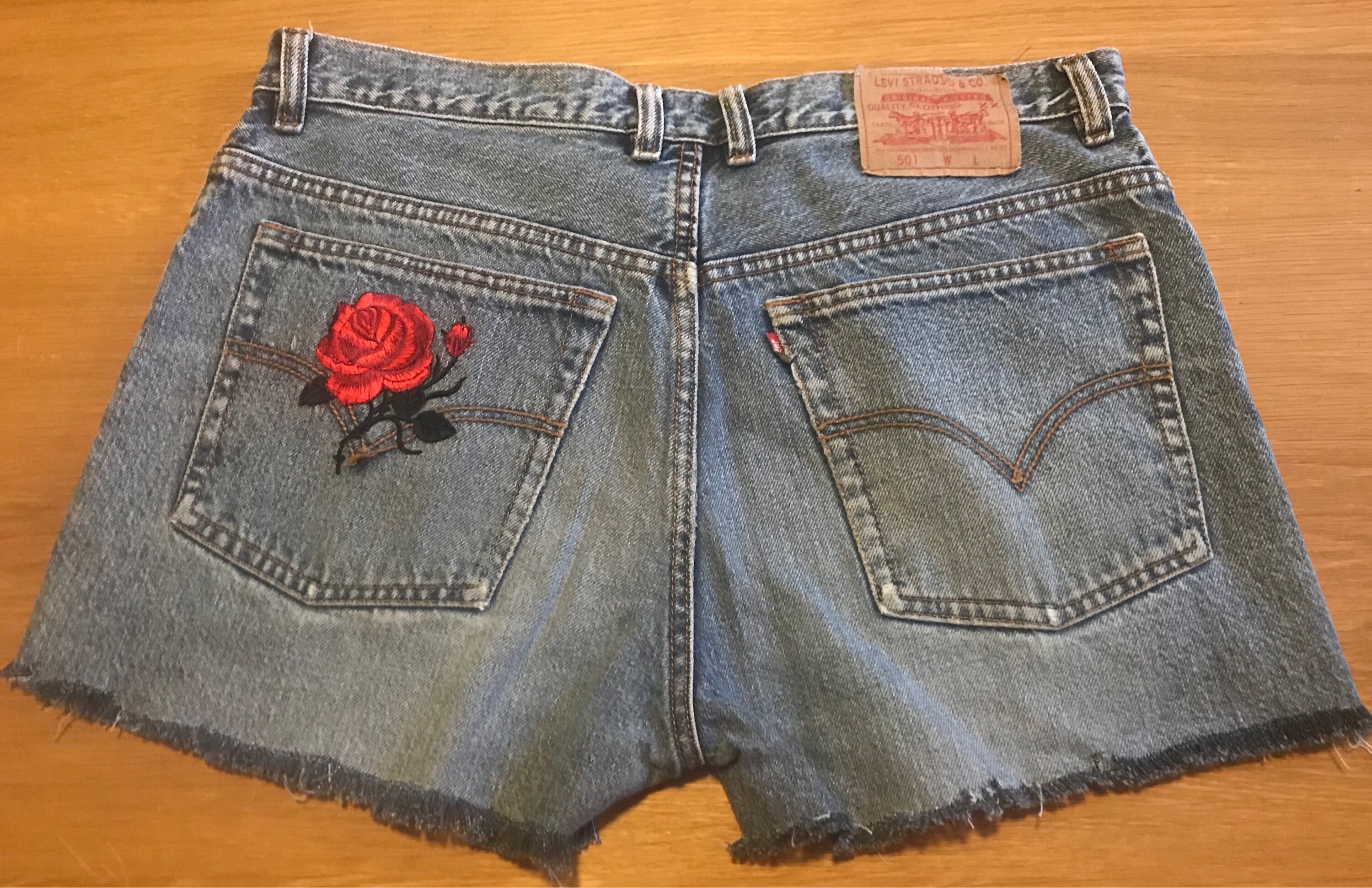 red distressed jean shorts