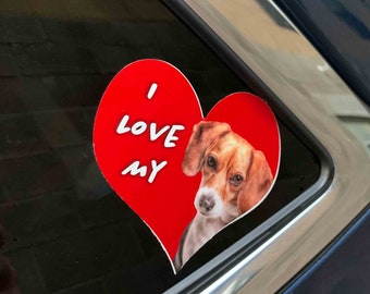 May include: Red heart-shaped sticker with the text "I love my" and a beagle dog peeking out from the right side of the heart.