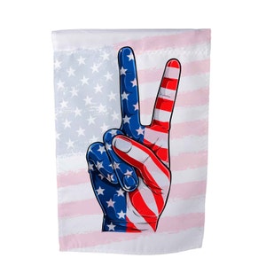 May include: A peace sign with the American flag design. The peace sign is red, white, and blue. The background is a white and pink American flag.