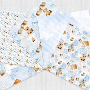 Pu&ograve; includere: Un set di sei carte digitali con un motivo blu e bianco con orsacchiotti, blocchi e ciucci. Le carte sono perfette per lo scrapbooking, la creazione di biglietti e altri progetti di artigianato.