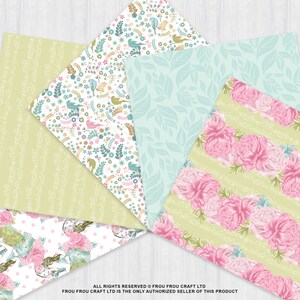 May include: A collection of patterned papers with floral and botanical designs. The papers feature various patterns, including pink roses, birds, leaves, and polka dots, in shades of green, pink, and blue. The papers are arranged in a fan shape, showcasing the different designs.