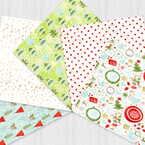 May include: Four different Christmas themed wrapping paper designs. The first design features a white background with gold snowflakes. The second design features a green background with blue and white Christmas trees. The third design features a white background with red polka dots. The fourth design features a white background with red, green, and gold Christmas ornaments, bells, and trees.