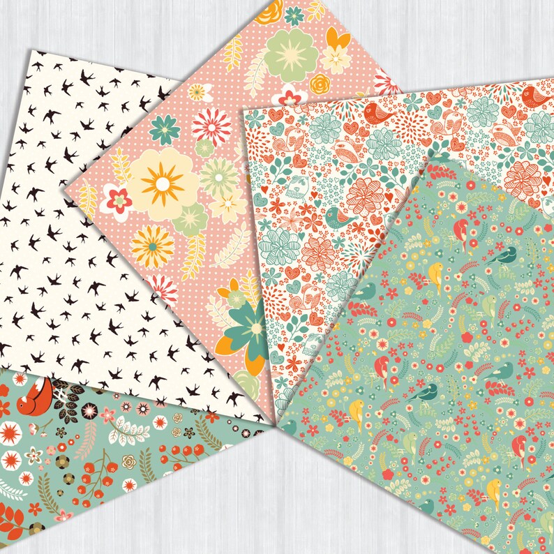 May include: Five different patterned paper sheets with floral and bird designs. The patterns include pink with white polka dots and yellow flowers, white with black birds, green with yellow and red birds, white with red and green flowers, and white with red and blue flowers.