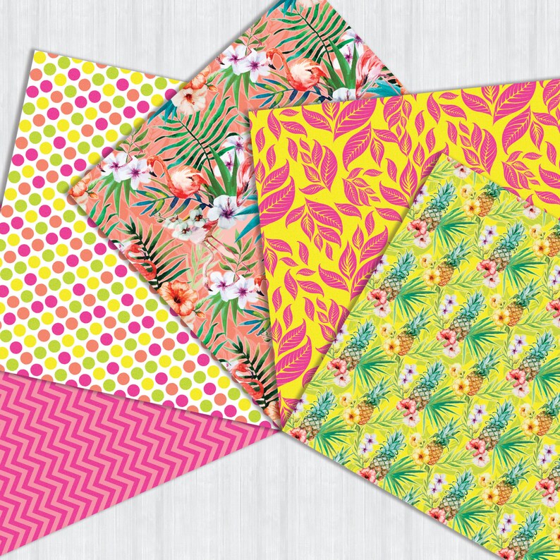 May include: Five different patterned paper sheets with tropical themes. The patterns include pink and green polka dots, pink and yellow chevron, pink and yellow leaves, pink flamingos and flowers on a peach background, and pineapples and flowers on a yellow background.