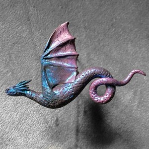 Winged dragon ornament for screen window door