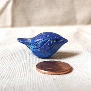 Little bird pocket charm