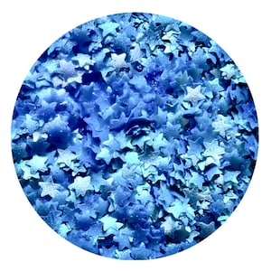 May include: A close-up image of blue glitter stars. The stars are iridescent and have a holographic finish.