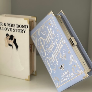 Kate spade pride and prejudice clutch best sale