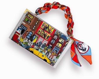 Embroidered New York book bag clutch, red and gold evening purse