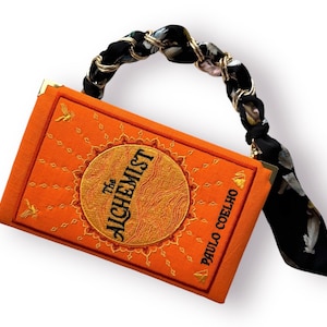 Cartera de mano bordada, regalo para amantes de los libros Alchemist - naranja
