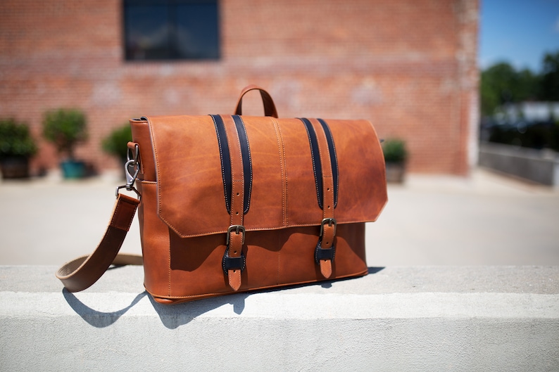 tan leather messenger bag
