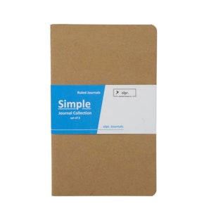 May include: A brown cardboard journal with a blue label that says "Simple Journal Collection set of 3" and "olpr. Journals".