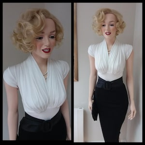 To order...Stretchy  black wiggle skirt and white cap sleeve blouse