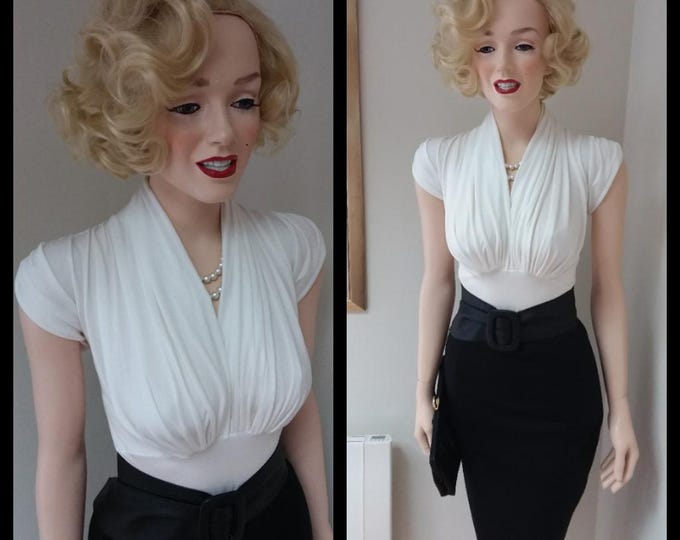 To order...Stretchy  black wiggle skirt and white cap sleeve blouse