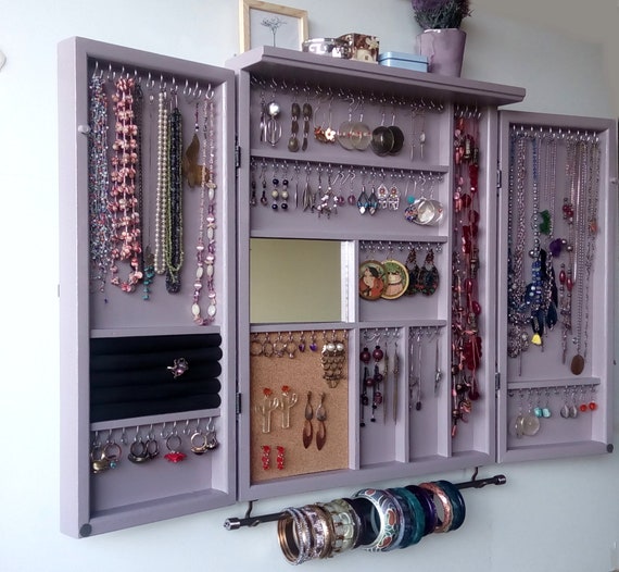 mirror with jewelry storage