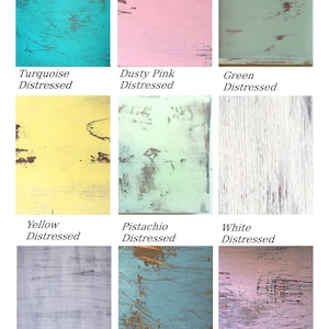 May include: Nine different color samples of distressed wood paint. The colors are turquoise, dusty pink, green, yellow, pistachio, white, ice gray, marine, and light mauve.
