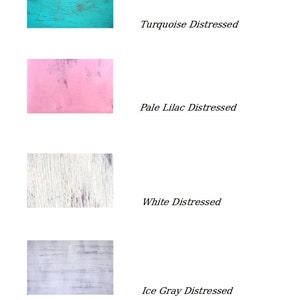 May include: Four wood samples showing different distressed paint colors: turquoise, pale lilac, white, and ice gray.
