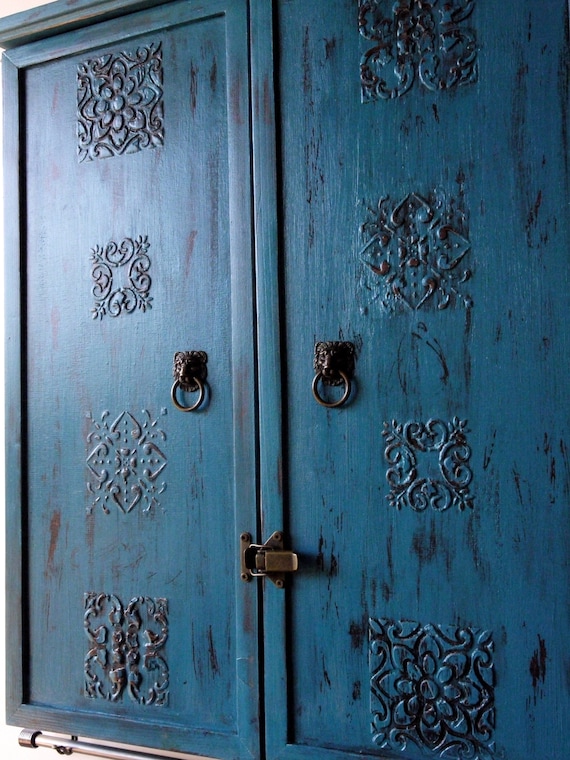 Turquoise armoire on sale