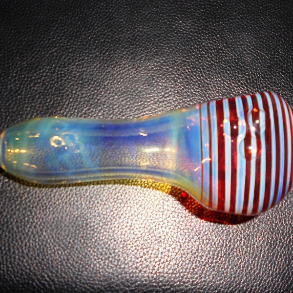 Glass Pipe, Color Changing, with a Dark Red Spiral.