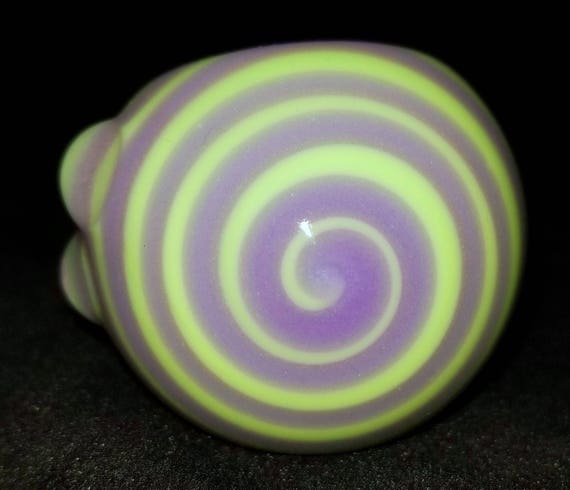 with a Purple Spiral Made in the U.S.A. Translucent Teal Glass Pipe
